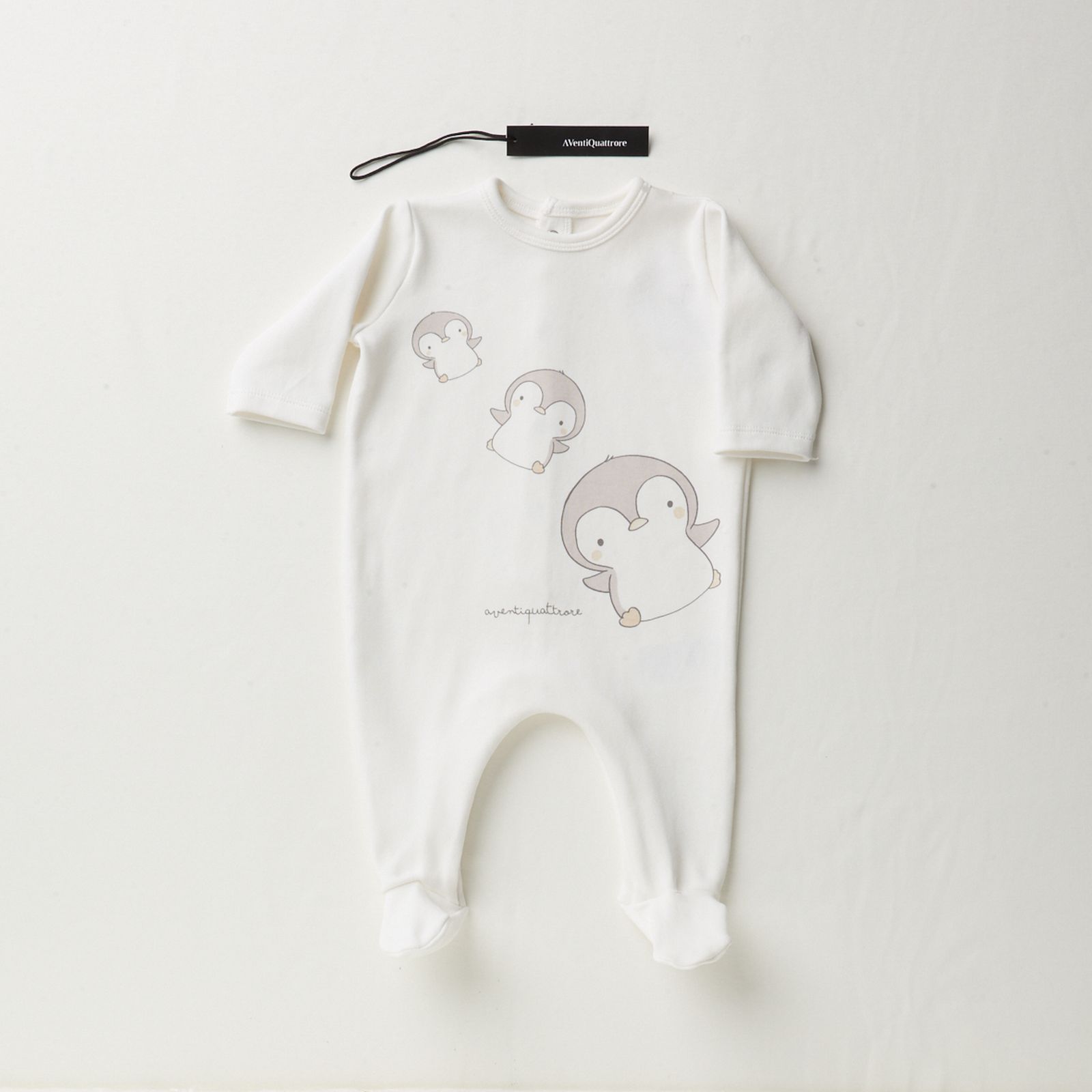 Tutina aperta dietro con piede Nursery per un comfort e uno stile unici per i tuoi piccoli